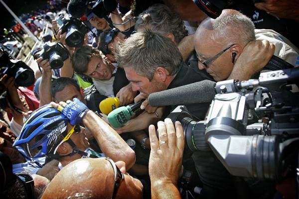 The media swarms Alberto Contador after his victory in stage 17 at the Vuelta.