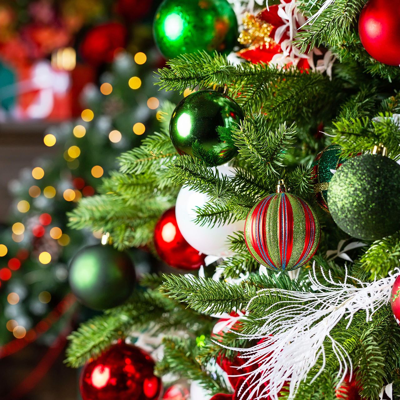 Christmas tree and home holiday decorations with balls and lights