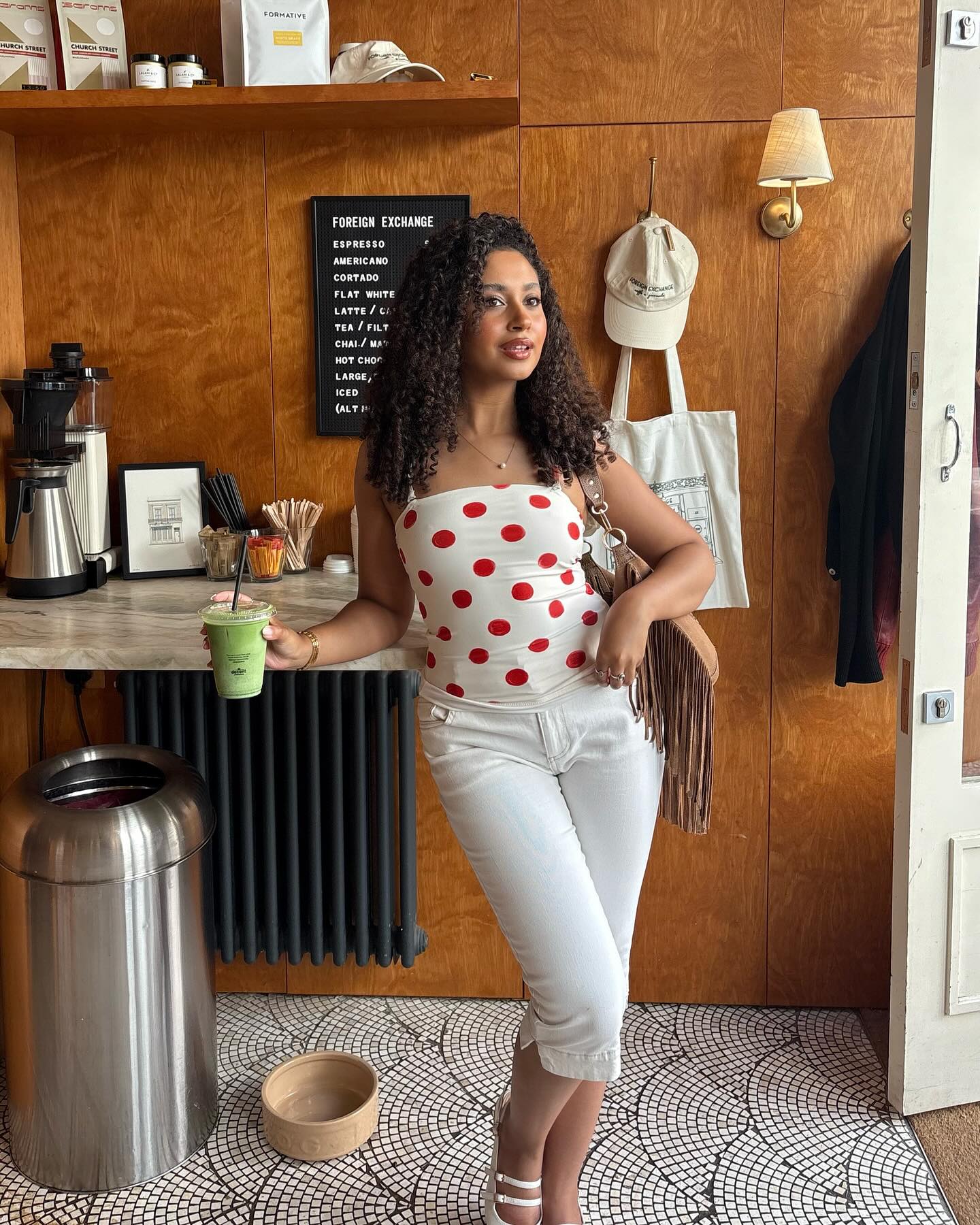 An image of @laylaabbey wearing one of the best capri pants for petites.