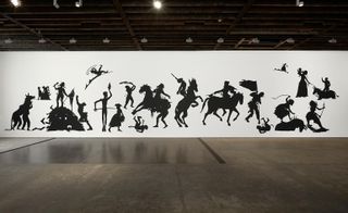 Silhouette art of battle scene