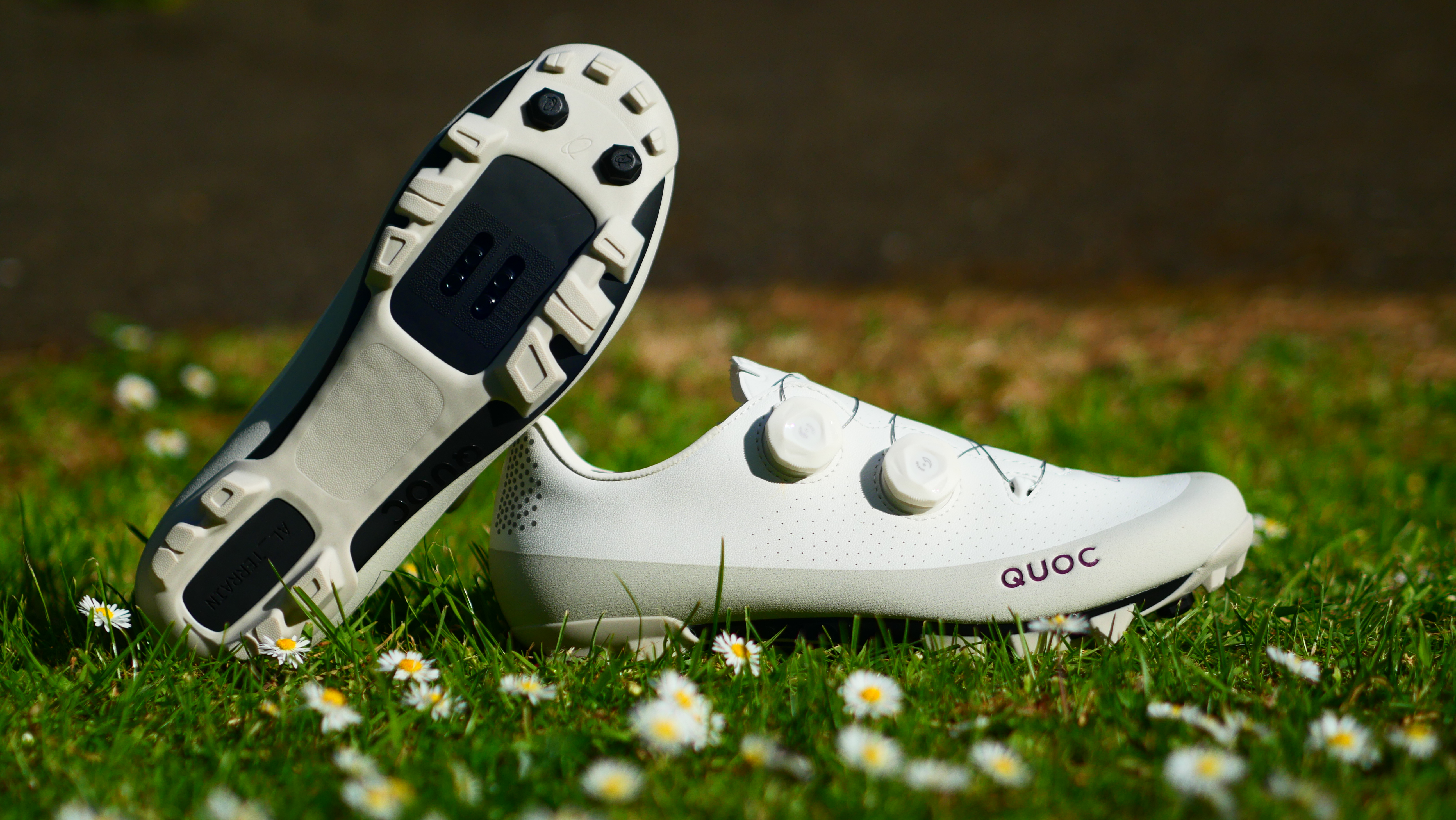 A pair of white Quoc Gran Tourer CX shoes