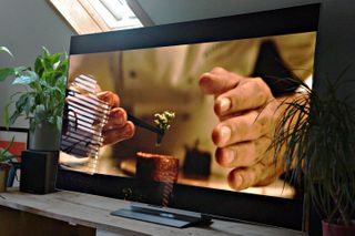 A scene from Netflix Hunger on the LG G3 OLED TV with house plants