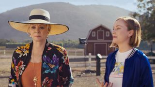 Jean Smart and Hannah Einbinder stand in front of a farm in Hacks