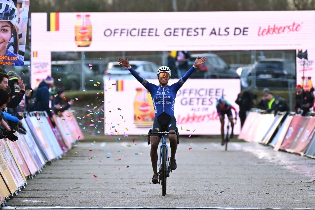 ZONHOVEN BELGIUM DECEMBER 22 Ceylin Del Carmen Alvarado of The Netherlands and Team FenixDeceuninck celebrates at finish line as race winner during the 28th Zonhoven UCI CycloCross Worldcup 2024 Womens Elite on December 22 2024 in Zonhoven Belgium Photo by Luc ClaessenGetty Images