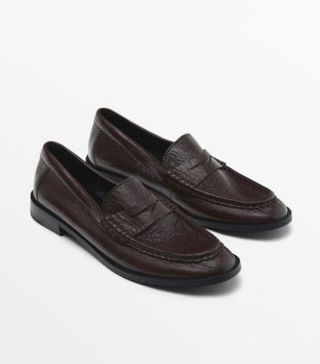 Image of brown leather loafers