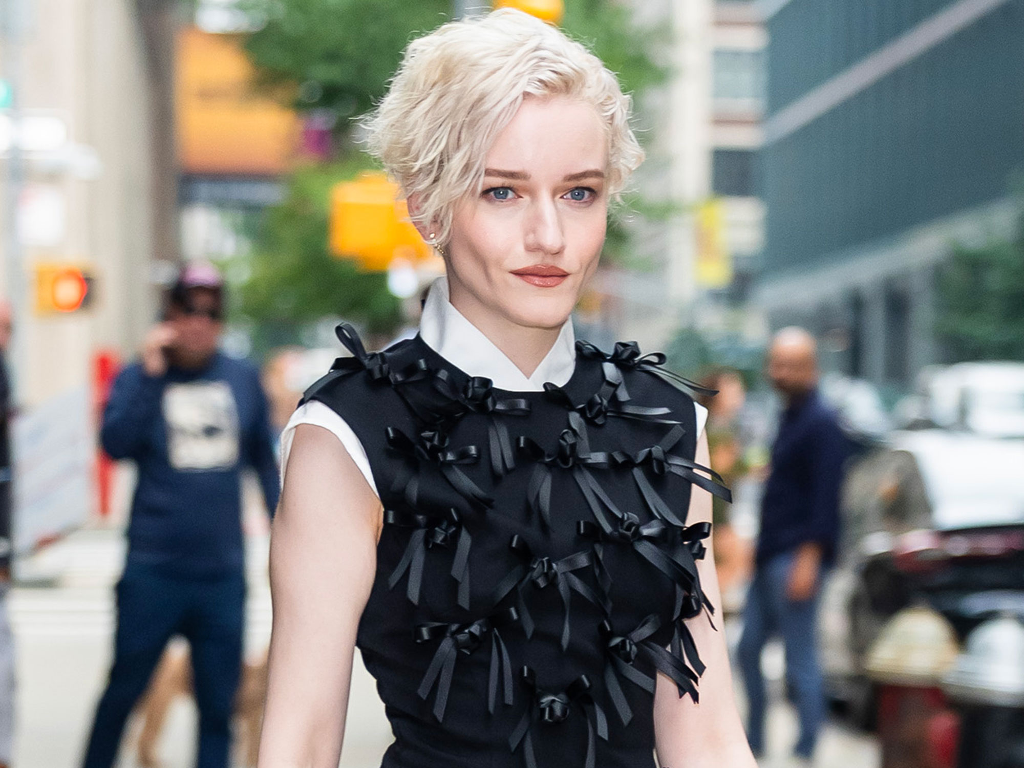 Julia Garner wears black leggings