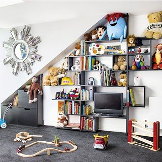 childrens room with wall shelves and toys