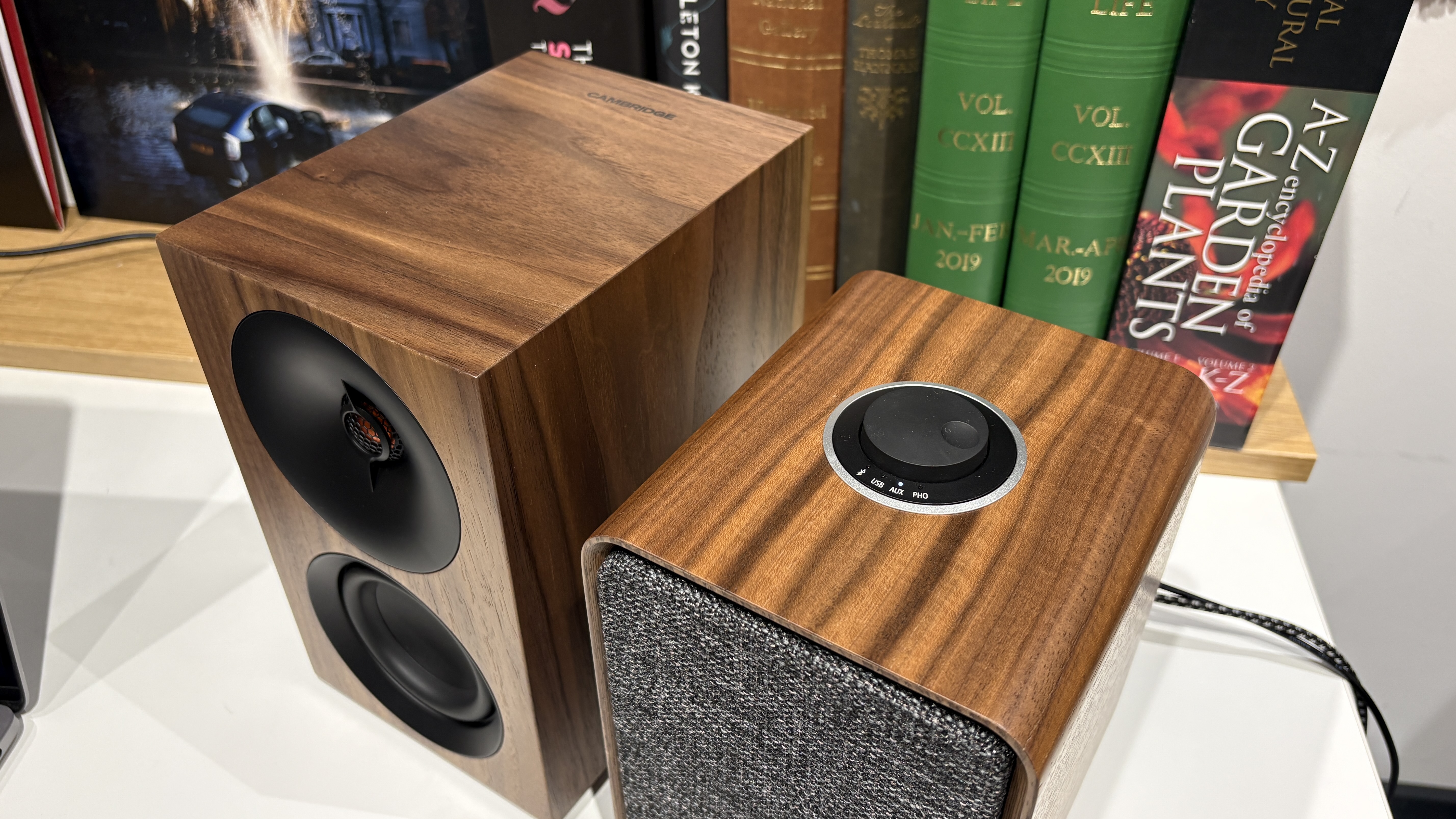 Ruark MR1 Mk3 and Cambridge L/R S speakers side-by-side on white table