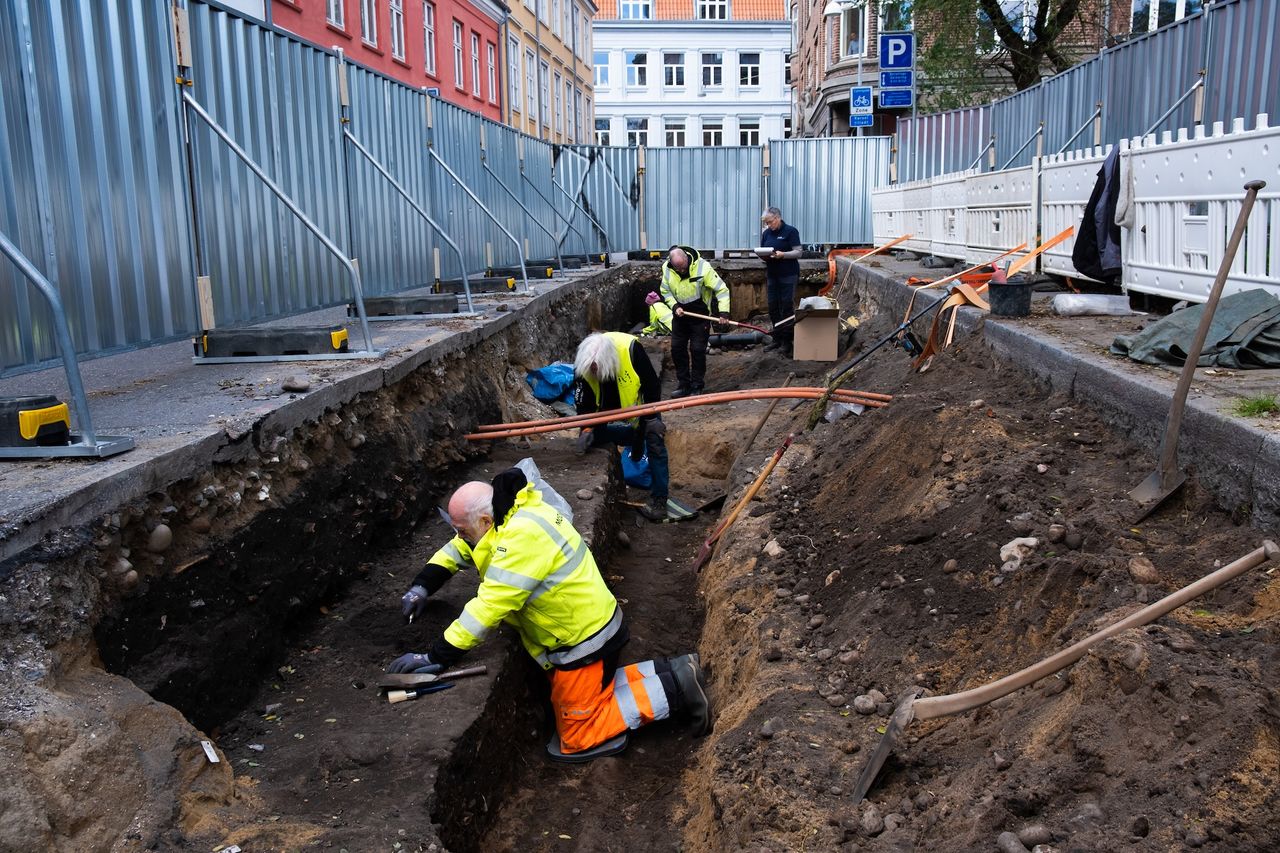 archaeologists work to excavate the area
