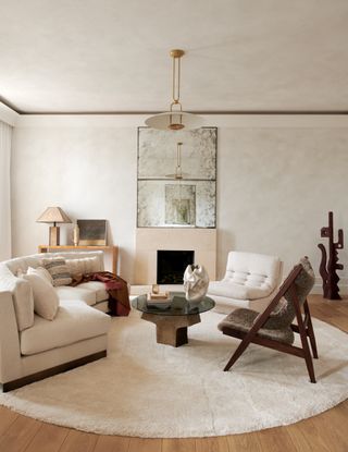 minimaluxe living room with fireplace and mirror