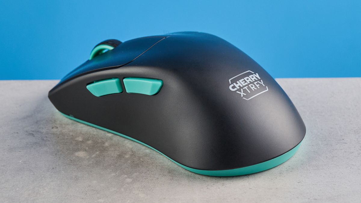 A black and teal Cherry XTRFY M64 Wireless gaming mouse