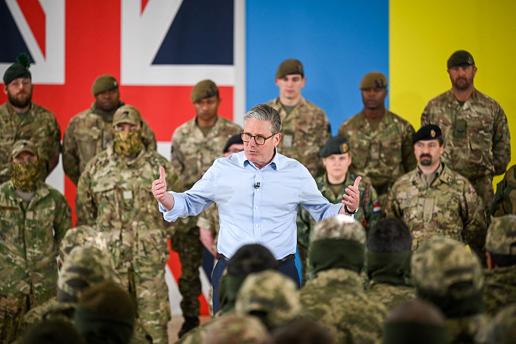 Britain&#039;s Prime Minister Keir Starmer speaks on stage to the troops