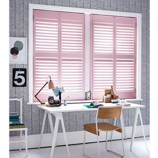 home office with desk chairs and wood shutters little greene pink slip