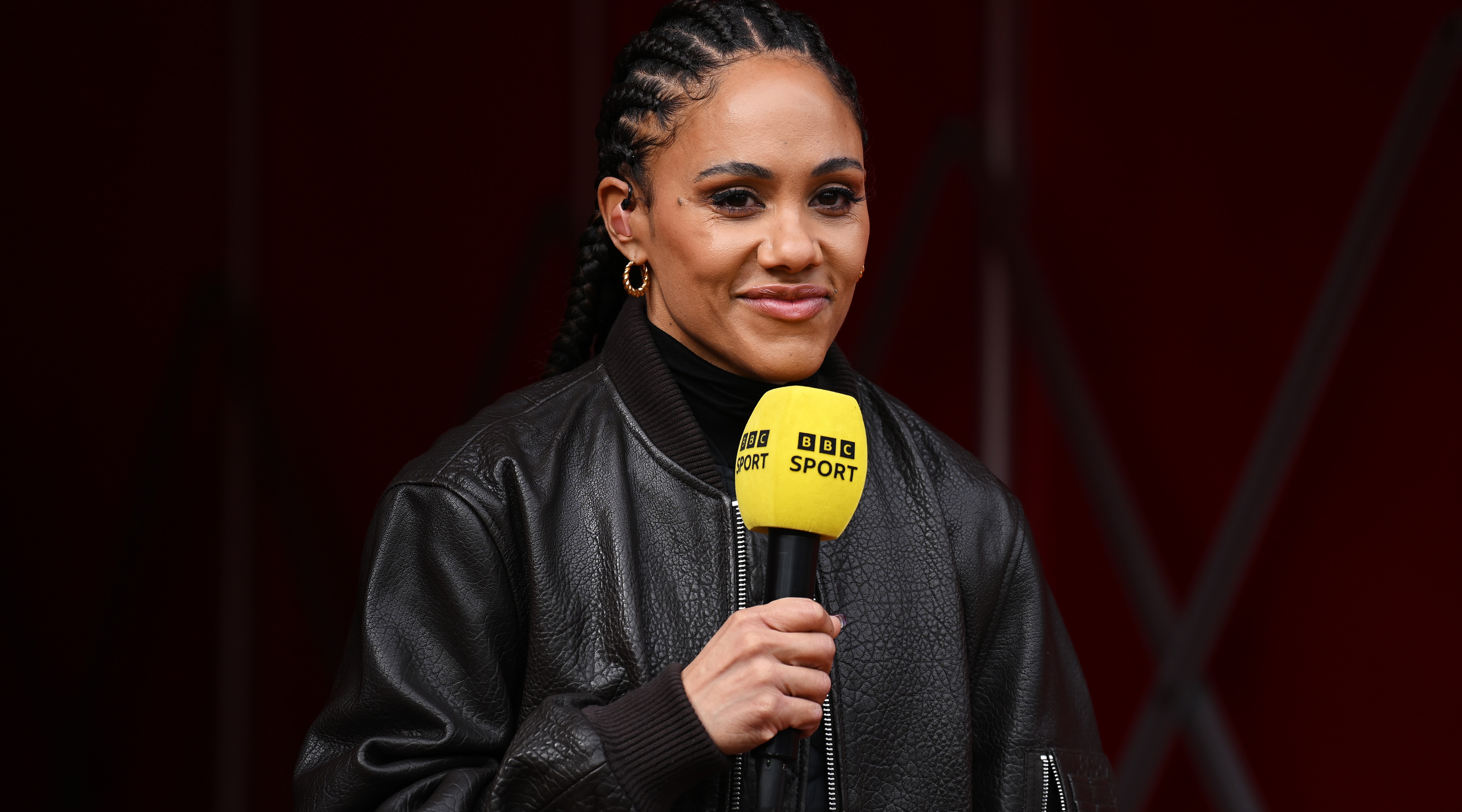 LONDON, ENGLAND - MARCH 03: Former Arsenal player Alex Scott looks on whilst working for BBC Sport prior to the Barclays Women's Super League match between Arsenal FC and Tottenham Hotspur at Emirates Stadium on March 03, 2024 in London, England. (Photo by Alex Burstow/Arsenal FC via Getty Images)