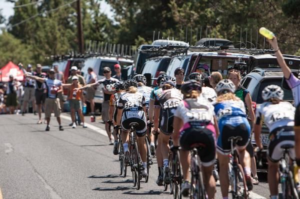 The women's field heads into the feed zone.