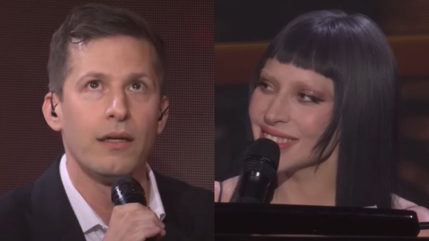 From left to right: Andy Samberg looking up while holding a mic up to his face and Lady Gaga smiling and looking to her left.