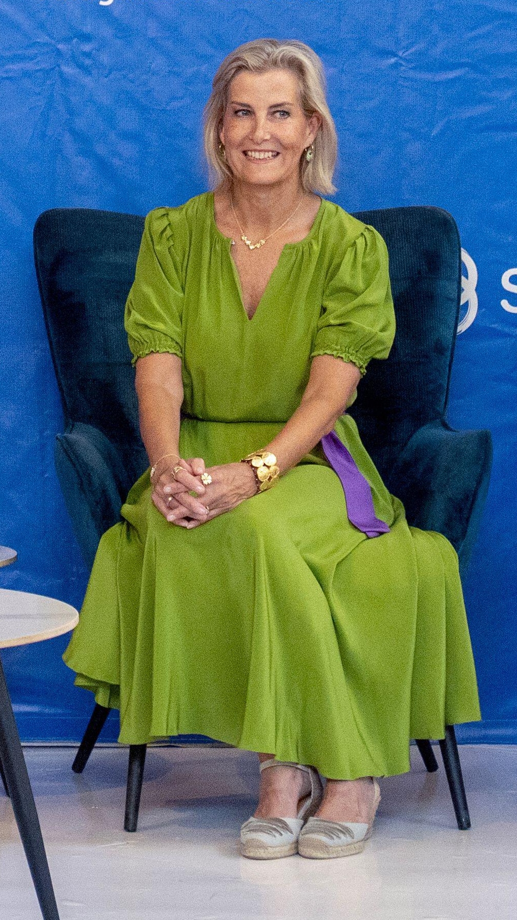 Duchess of Edinburgh sits down as she attends the Orbis Eye Health reception at the Latitude 15 Degrees Hotel in Lusaka, during her tour of Zambia