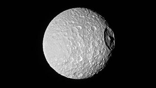 Mimas with the prominent Herschel Crater visible on the right-hand side.