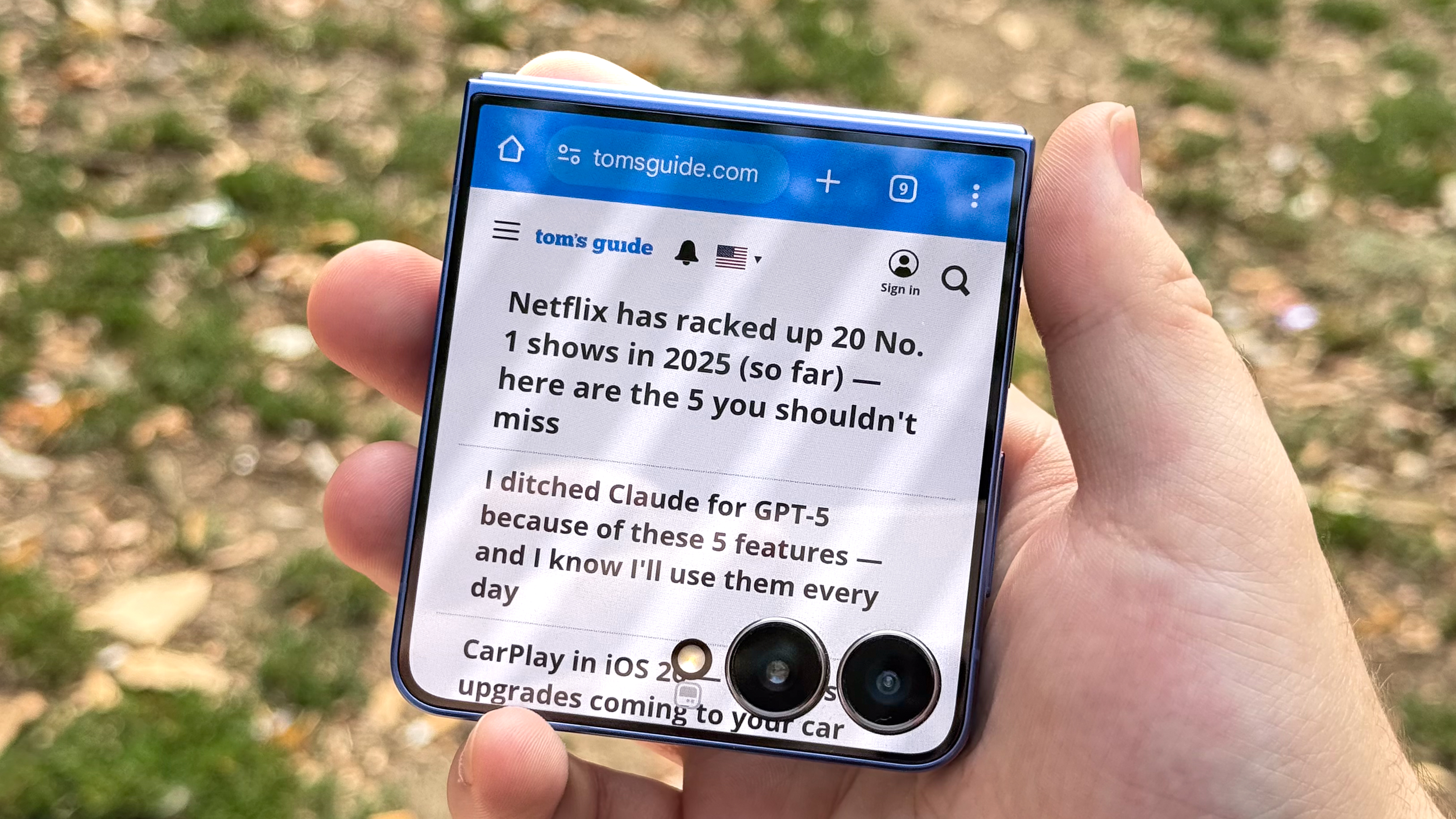 Samsung Galaxy Z Flip 7 browsing Tom's Guide in Chrome on its cover screen