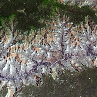 The Advanced Thermal Emission and Reflection Radiometer (ASTER) instrument on NASA's Terra spacecraft provided this spacebird's-eye view of the eastern part of Grand Canyon National Park in northern Arizona in this image, acquired July 14, 2011