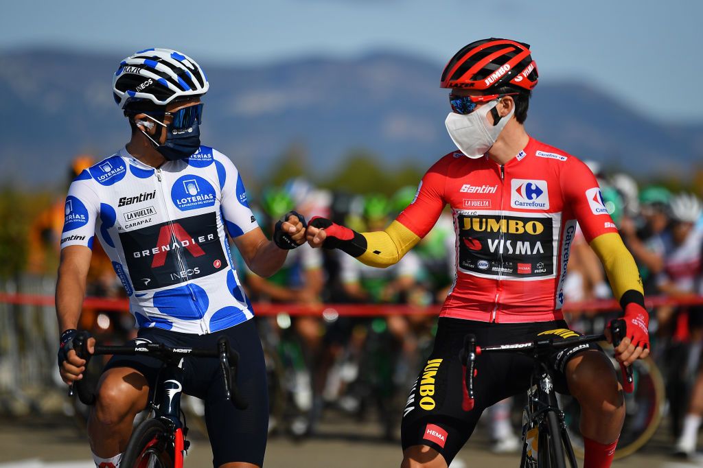 SABIANIGO SPAIN OCTOBER 24 Start Richard Carapaz of Ecuador and Team INEOS Grenadiers Polka Dot Mountain Jersey Primoz Roglic of Slovenia and Team Jumbo Visma Red Leader Jersey Mask Covid safety measures during the 75th Tour of Spain 2020 Stage 5 a 1844km Huesca to Sabinigo 835m lavuelta LaVuelta20 La Vuelta on October 24 2020 in Sabinigo Spain Photo by Justin SetterfieldGetty Images