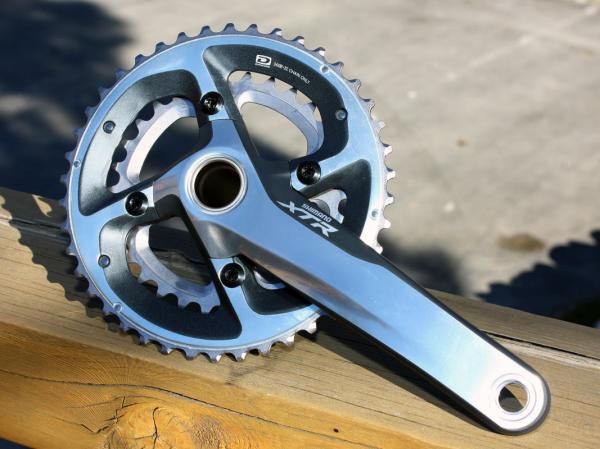Shimano will offer two-ring XTR 'Race' cranksets for the first time with M980. Chainring options will include 28/40T, 30/42T, or 32/44T - all with narrower pedal stance widths than on the triple cranks - plus a set of 26/38T rings that will bolt directly to the triple-ring crankarms for trail riders.