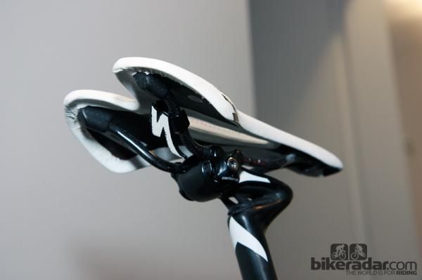 Just in case there's a shot of a rider using a Specialized saddle, the company devised these little logos that clip on to the rails.