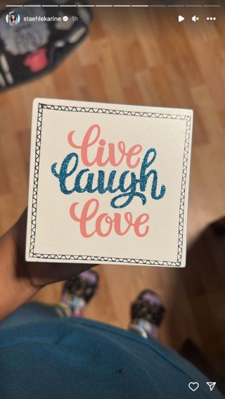 Karine posting a live laugh love sign