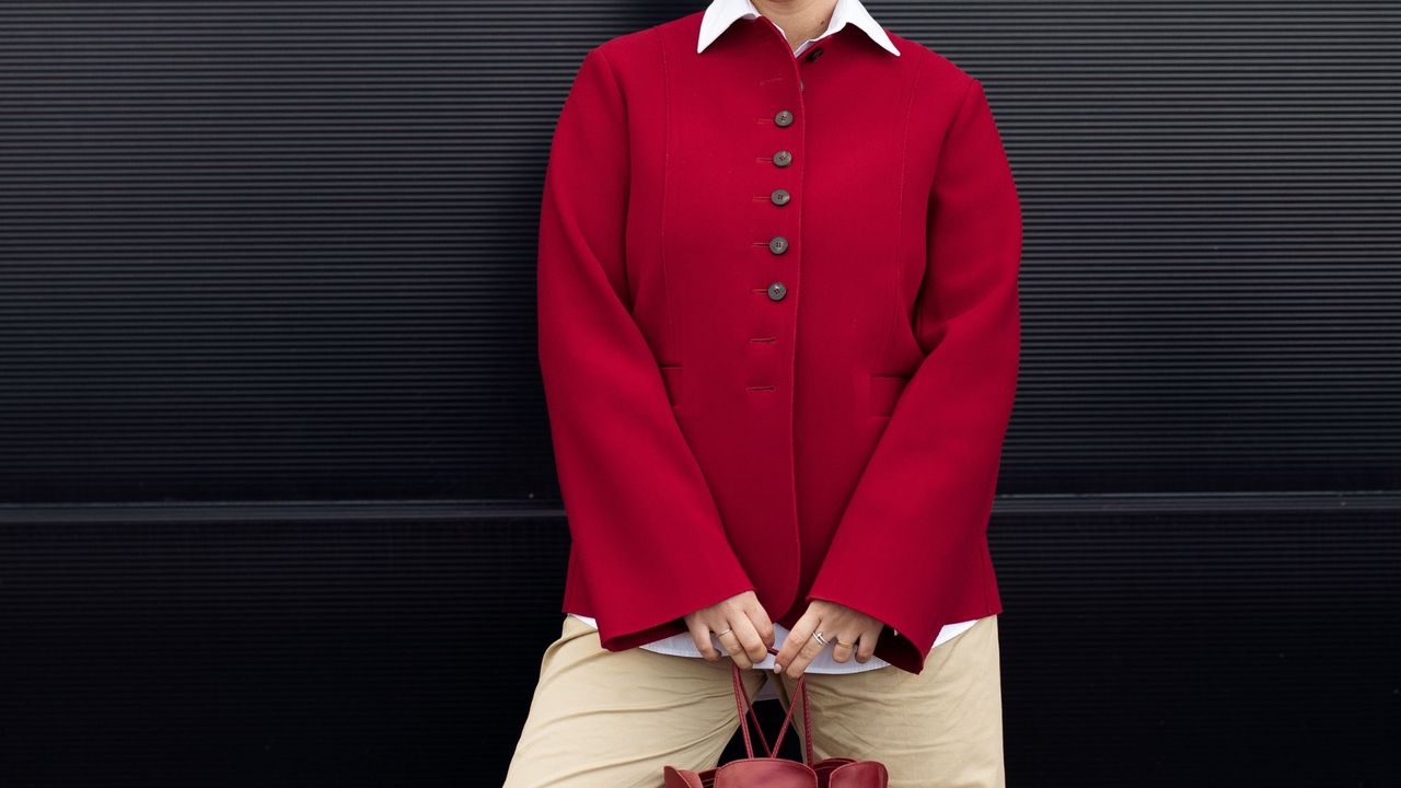 woman wearing red cardigan - boden sale