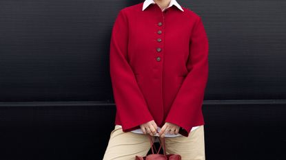 woman wearing red cardigan - boden sale