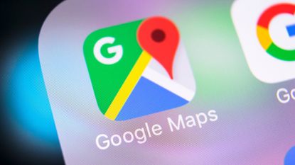 Google Maps app icon shown on a smartphone