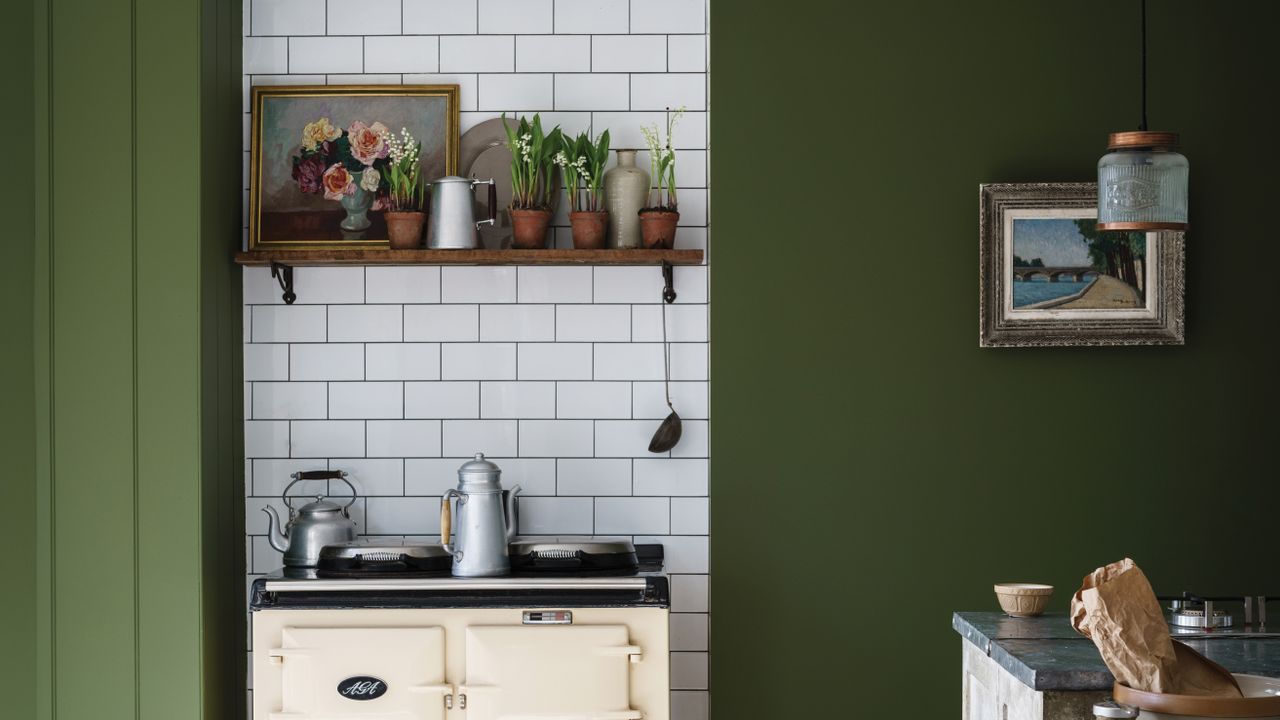 Green painted kitchen by Farrow &amp; Ball