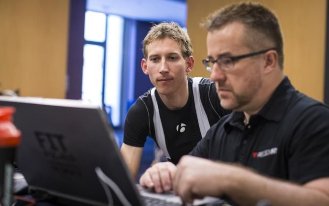 Off the bike and Mollema looks over his test results