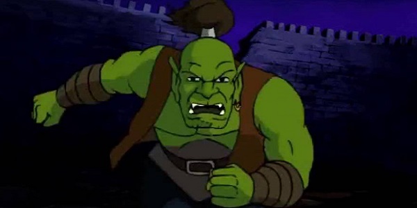 An orc charges in Warcraft Adventures.