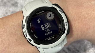 Garmin Instinct 2 with white case and band
