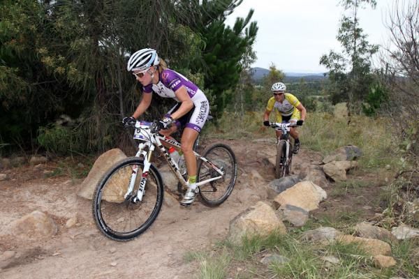 Rebecca Henderson leads Katherine O'Shea before being slowed by four punctures