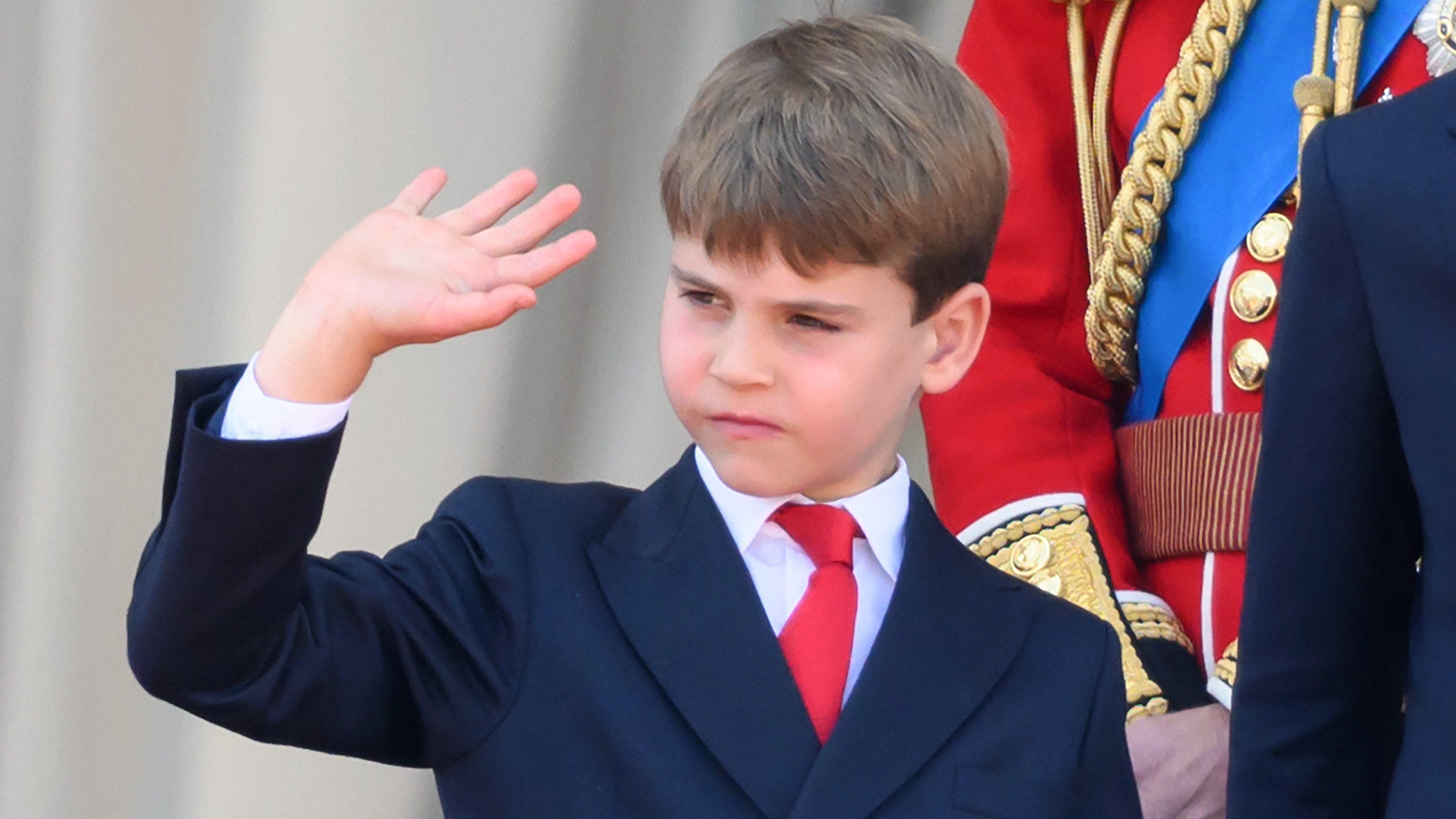 Prince Louis of Wales waves on the balcony of Buckingham Palace during Trooping The Colour 2025 on June 14, 2025