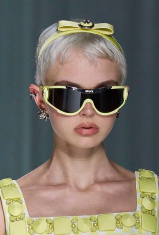 Short hairstyle with hair accessories at Versace Spring/Summer 2024