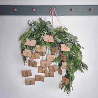 Green foliage and brown envelope advent calendar