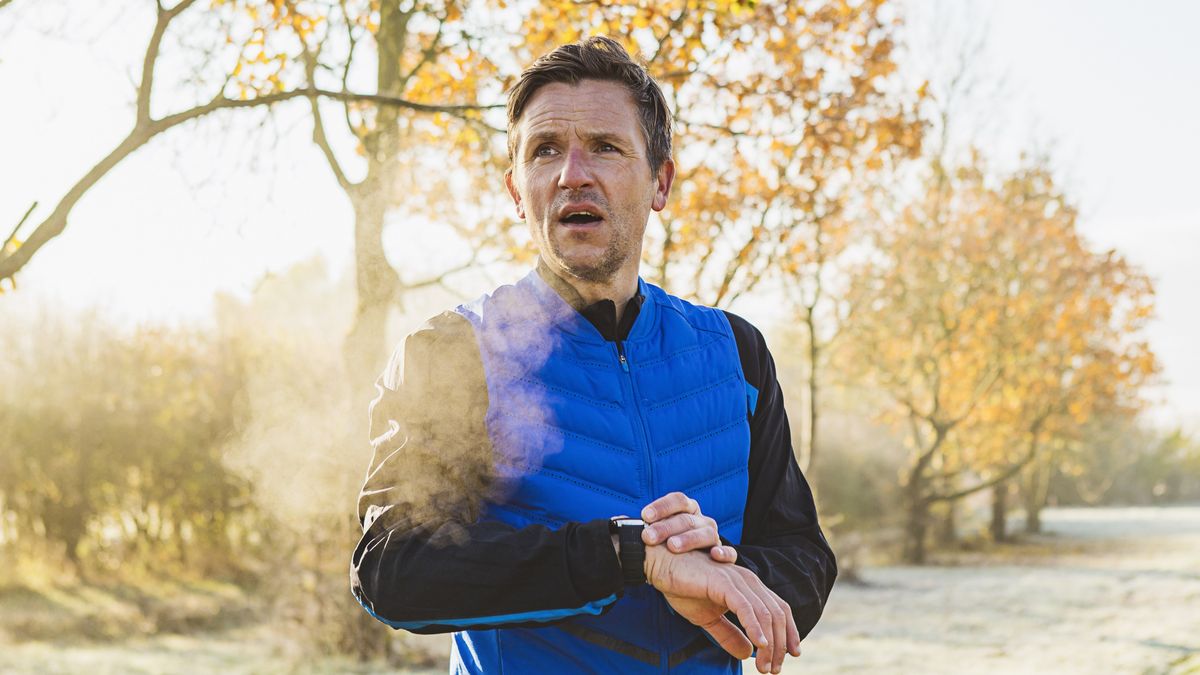 Man using sports watch during run