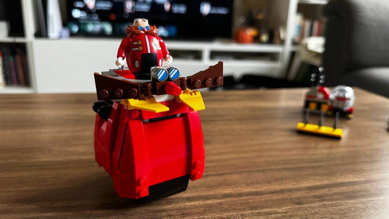 Lego Sonic vs. Dr. Eggman's Death Egg Robot pieces on a wooden coffee table