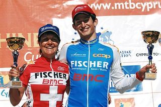 Team-mates Petra Henzi and Andreas Kugler (Fisher BMC) celebrate