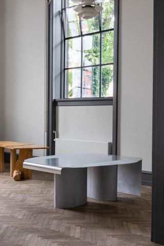 aluminium and wooden table, at Studies of a Table design exhibition, Copenhagen