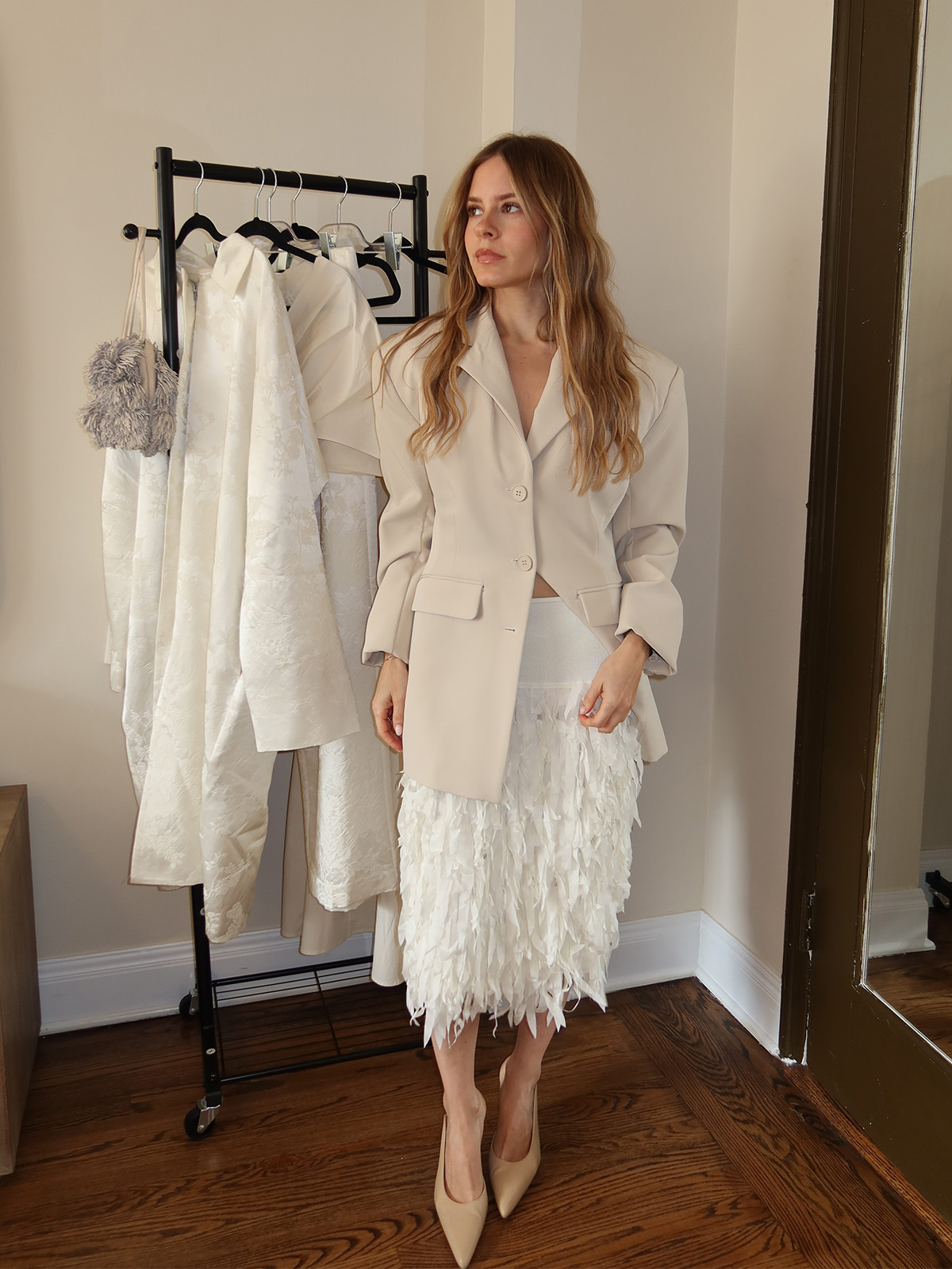 Nikki tries on pieces from St. Agni's bridal capsule.