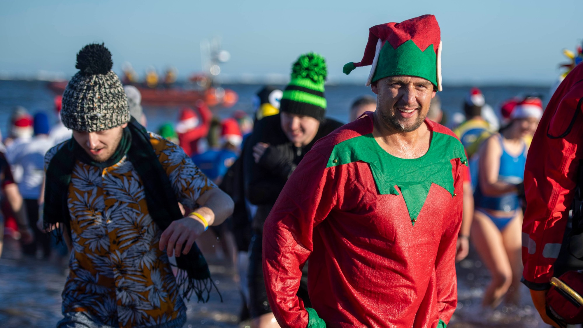 Swimmers emerging from the sea on New Year's Day