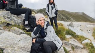 Hikers resting on a rock