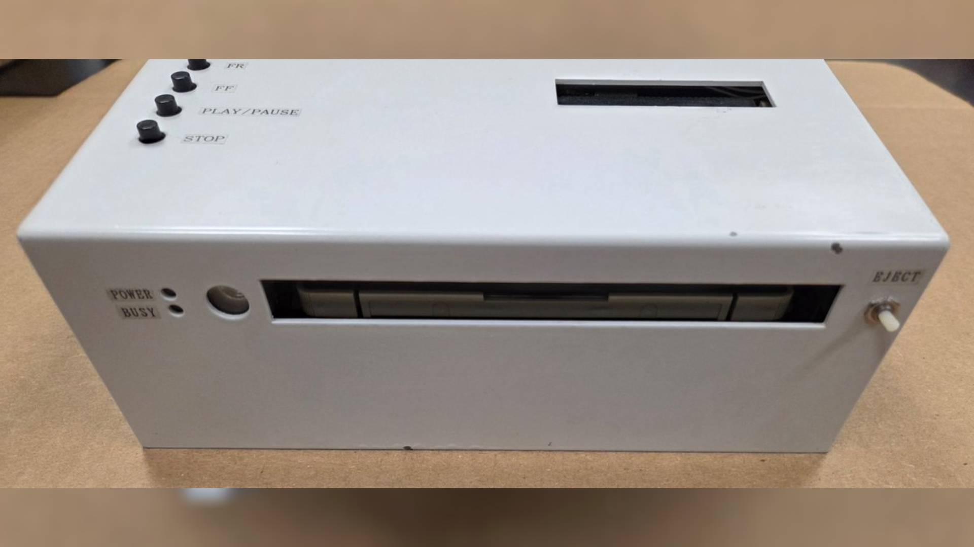 Front view of Nintendo PlayStation prototype with disc drive.