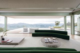green courtyard and views from Medellin mountain retreat