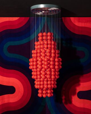 Ball Lamp type G by Verner Panton, consisting of a multitude of red plastic balls