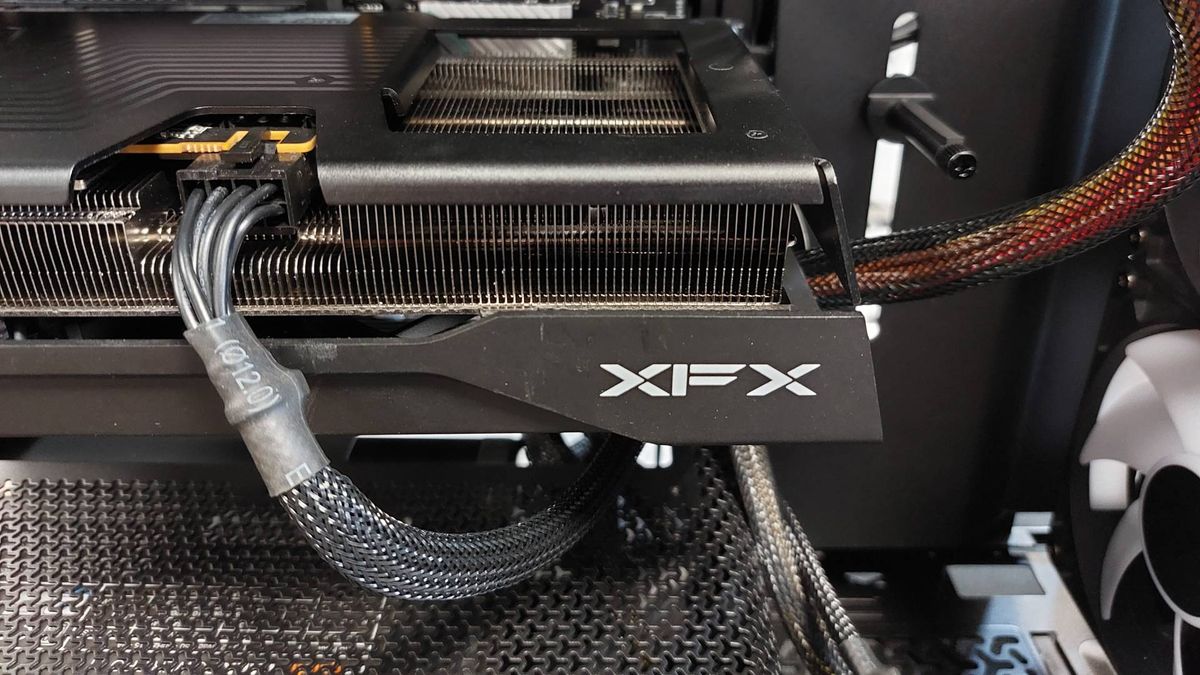 The Corsair Frame 4000X PC case seen at various stages of a PC build. This is a modular, mid-tower case with lots of options for customisation.